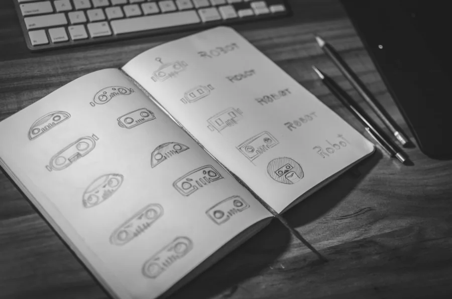 Portfolio Behance d'un graphiste tunisien affiché sur un écran avec projets d'identité visuelle