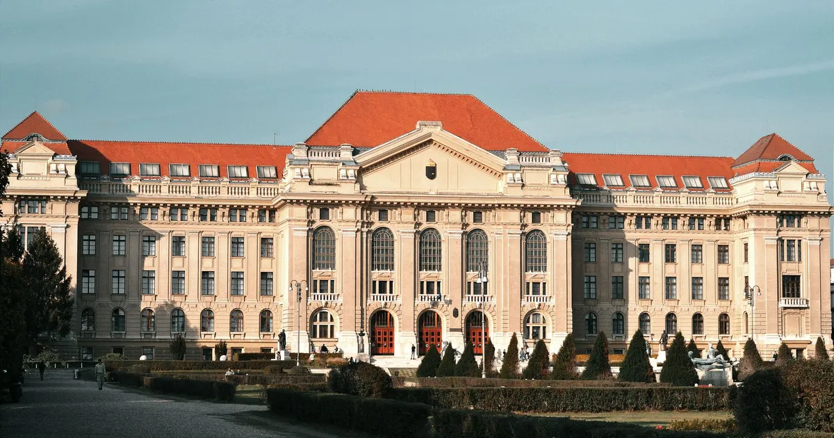 Historic university facade with baroque architecture in Debrecen, Hungary.